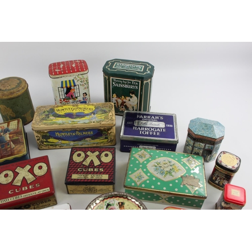 188 - A large collection of vintage advertising tins to include Macintosh, Carrs, Sainsburys etc.