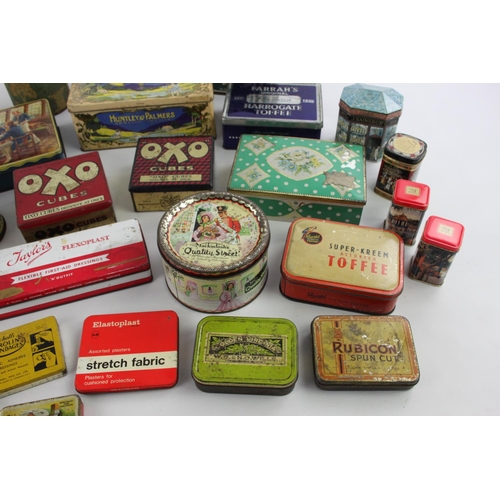 188 - A large collection of vintage advertising tins to include Macintosh, Carrs, Sainsburys etc.