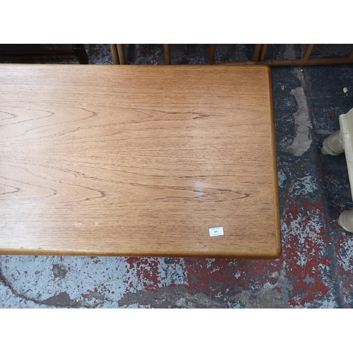 261 - A Meredew teak coffee table/media unit - approx. 44cm high x 120cm wide x 60cm deep