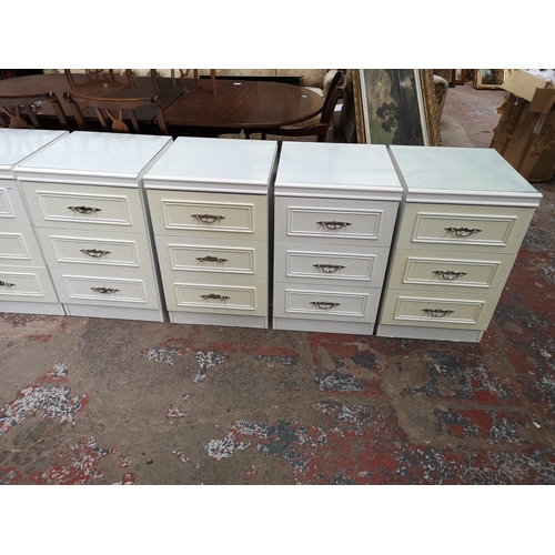 361 - Five pieces of late 20th century white laminate bedroom furniture, four bedside chests of three draw... 