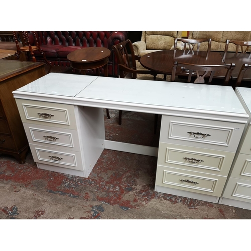 361 - Five pieces of late 20th century white laminate bedroom furniture, four bedside chests of three draw... 