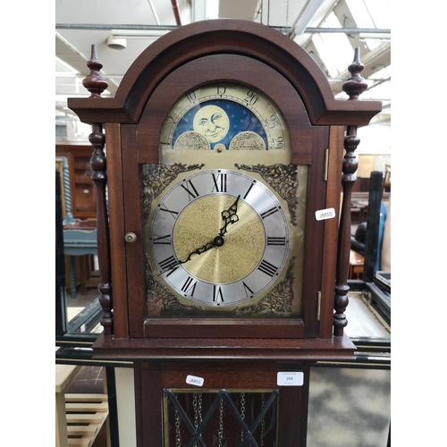 244 - A late 20th century mahogany cased grandmother clock with pendulum and three weights - approx. 165cm... 