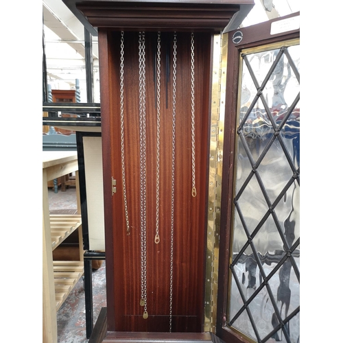 244 - A late 20th century mahogany cased grandmother clock with pendulum and three weights - approx. 165cm... 