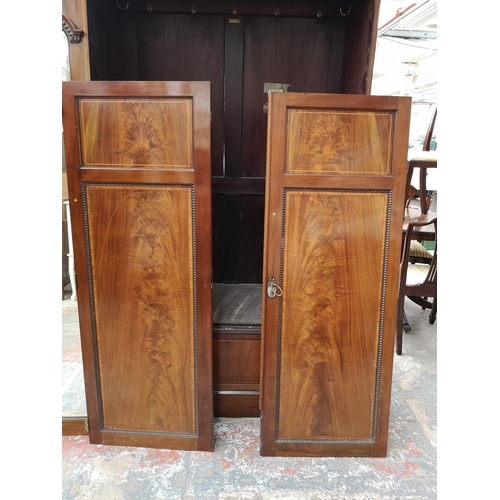 253 - A Liberty & Co Ltd inlaid mahogany triple wardrobe - approx. 241cm high x 188cm wide x 59cm deep