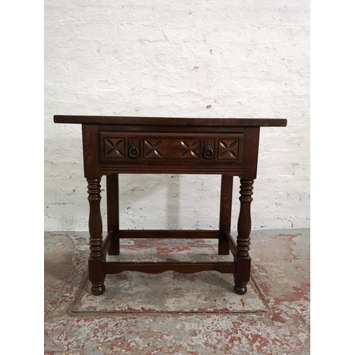 256 - A 17th century style carved oak rectangular joint side table