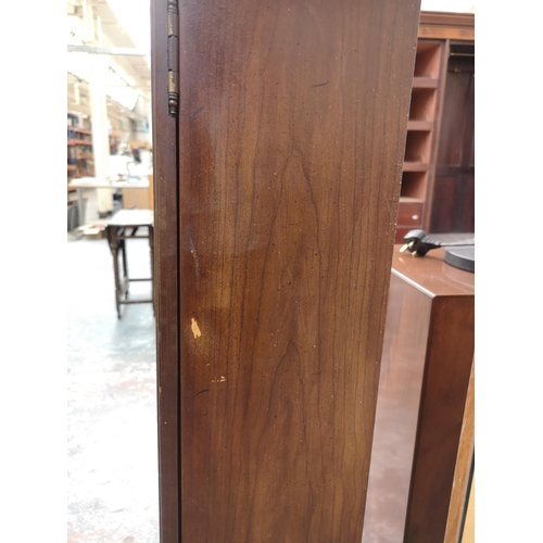 257 - A late 20th century Pearl mahogany cased grandfather clock