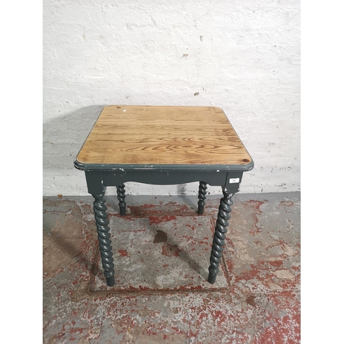 268 - An oak and grey painted square dining table on barley twist supports - approx. 77cm high x 68cm²