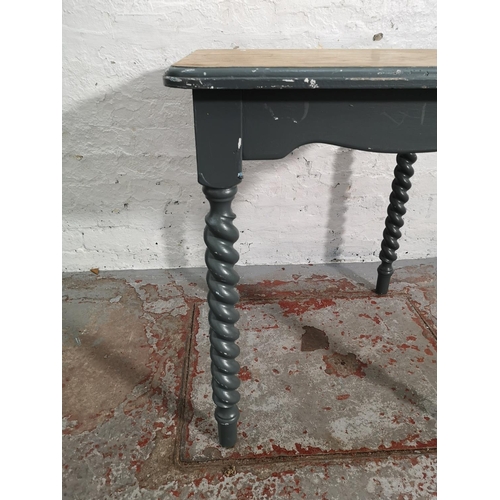 268 - An oak and grey painted square dining table on barley twist supports - approx. 77cm high x 68cm²