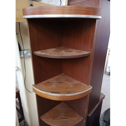 274 - A teak effect freestanding corner cabinet