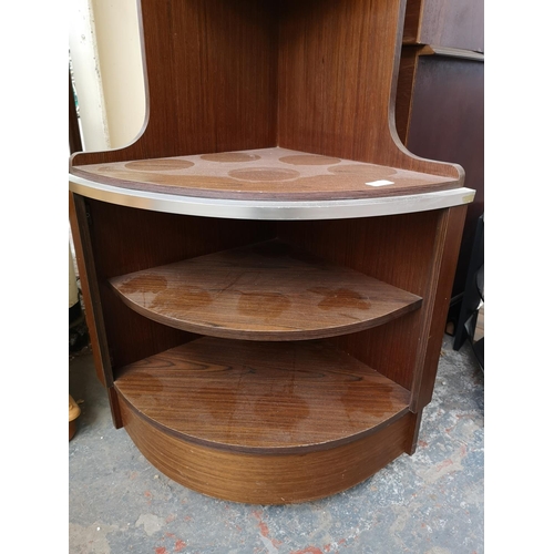 274 - A teak effect freestanding corner cabinet