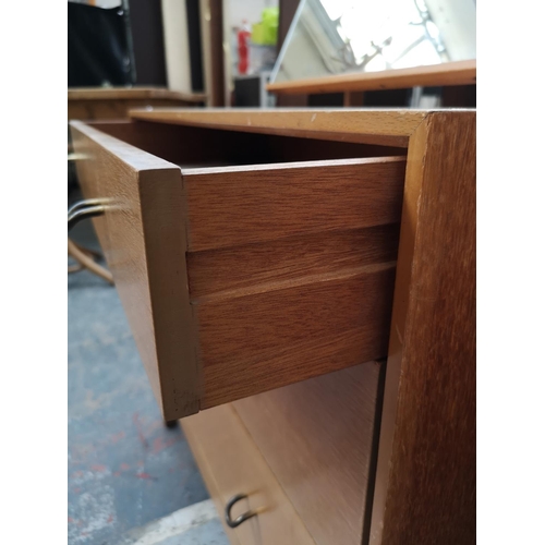 285 - A Stag oak dressing chest with three drawers and upper mirror