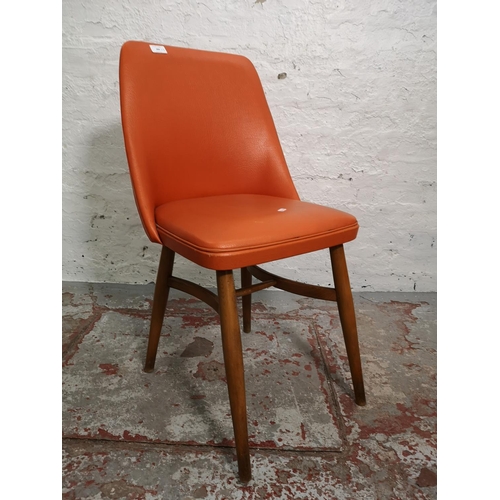 289 - Four mid 20th century dining chairs, three teak and one orange vinyl and beech