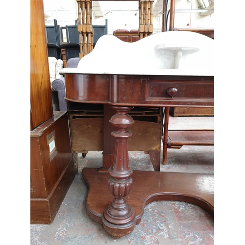 296 - A Victorian mahogany and marble top wash stand