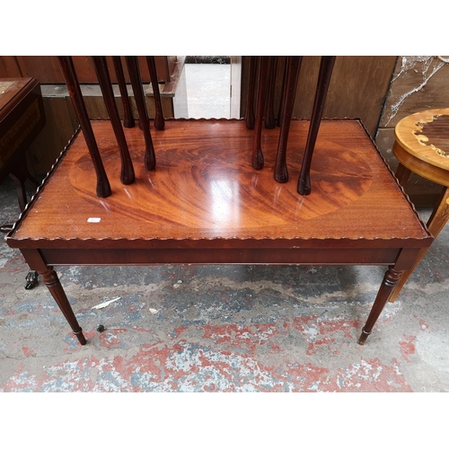 301 - Three pieces of furniture, mahogany nest of three tables with green leather inserts, mahogany rectan... 