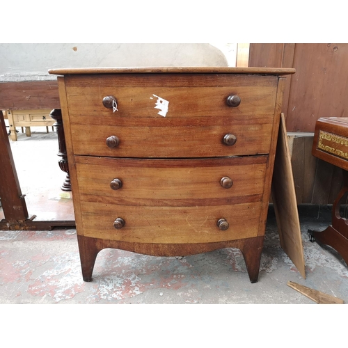 304 - A 19th century mahogany bow fronted commode