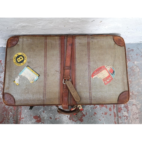 317 - Four vintage travel trunks