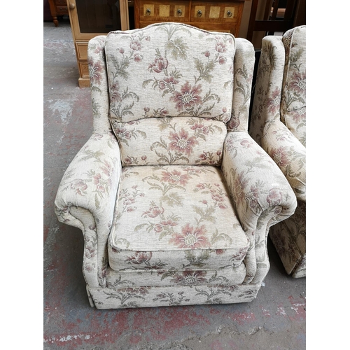 319 - An Alstons Rutland floral upholstered two piece lounge suite comprising three seater sofa and armcha... 