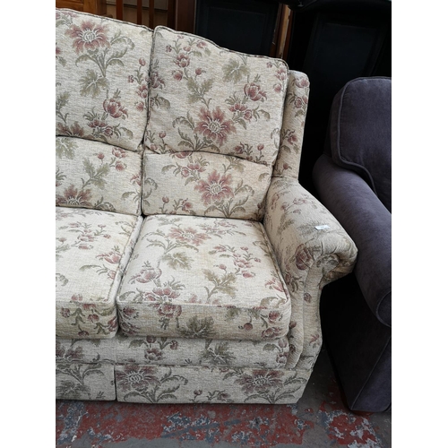 319 - An Alstons Rutland floral upholstered two piece lounge suite comprising three seater sofa and armcha... 