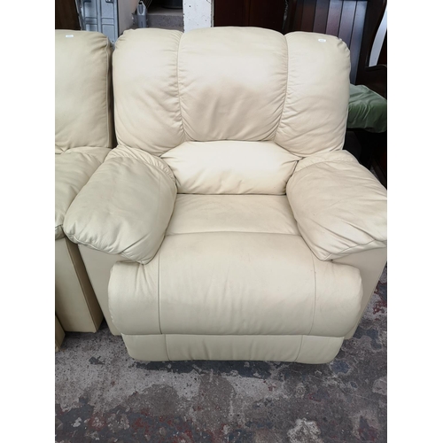 322 - Three items, two cream leather reclining armchairs and one cream leather two seater sofa