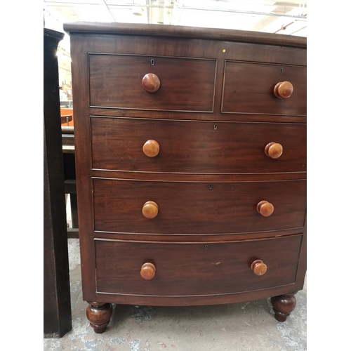 328 - A Victorian mahogany bow fronted chest of two short over three long drawers