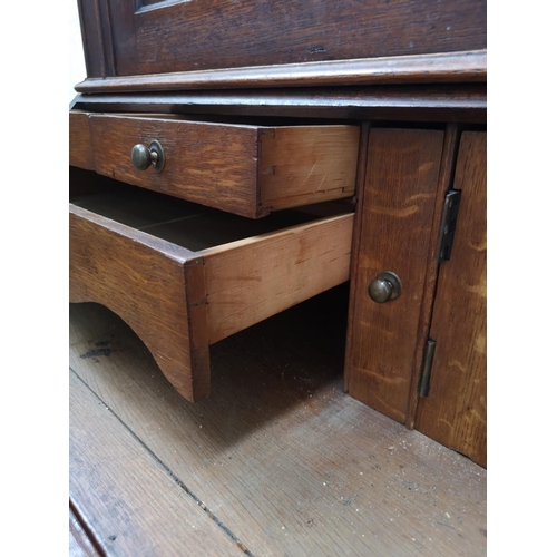 330 - A George III oak bureau bookcase - approx. 220cm high x 122cm wide x 52cm deep