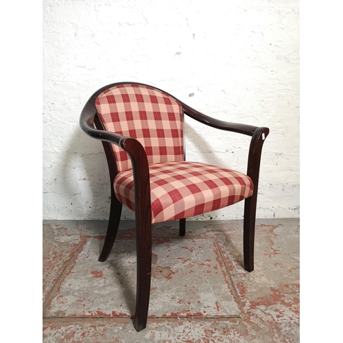 336 - A pair of mahogany effect and red checkered armchairs