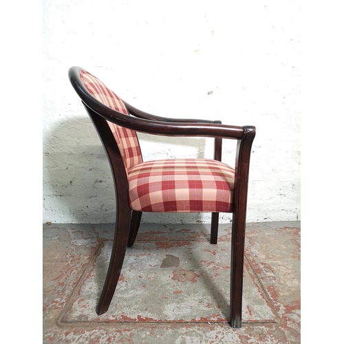 336 - A pair of mahogany effect and red checkered armchairs