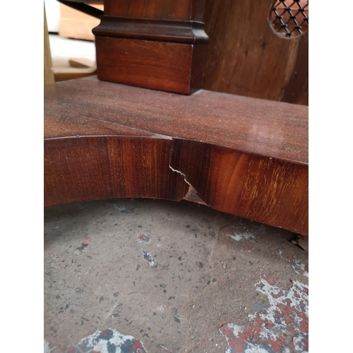 339 - A Victorian mahogany hall table with carved lion paw supports and two drawers