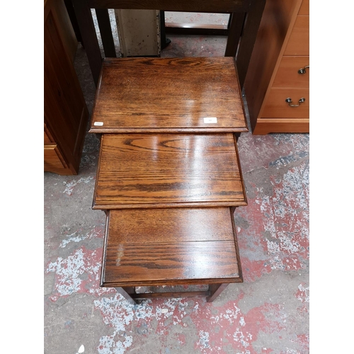 347 - Two pieces of oak furniture, one early 20th century hall stand with central bevelled edge mirror and... 