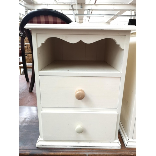 353 - A pair of modern painted pine bedside chests of two drawers