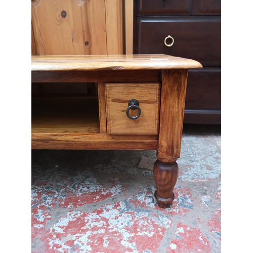 359 - An Indian sheesham wood rectangular coffee table