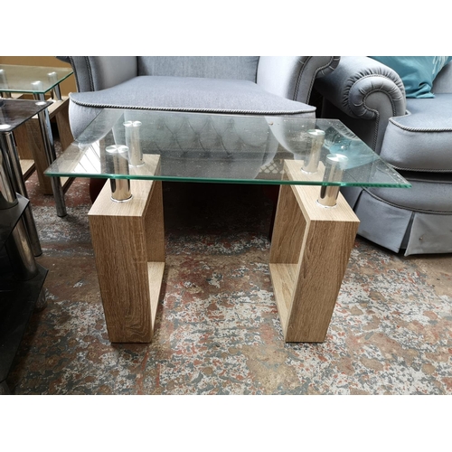 376 - Five pieces of modern glass furniture, two black glass side tables, two oak effect and tempered glas... 