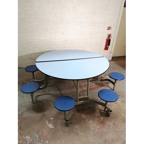 380 - A Spaceright Shur-Lock eight seat folding shaped canteen table