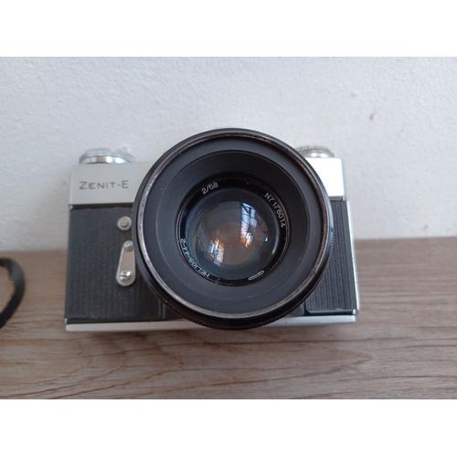 434 - A cased KMZ Zenit-E 35mm SLR camera fitted with Helios-44-2 2/58 lens