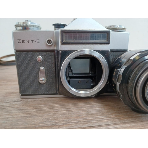 434 - A cased KMZ Zenit-E 35mm SLR camera fitted with Helios-44-2 2/58 lens