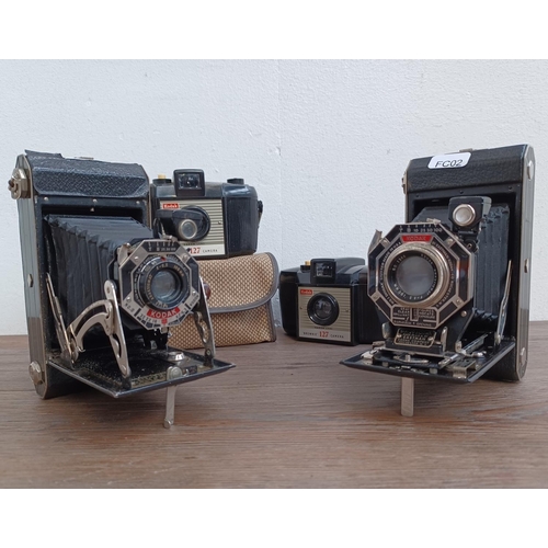 439 - Four vintage Kodak cameras, one Art Deco Six-20 folding, one Art Deco Six-20 II folding and two 'Bro... 