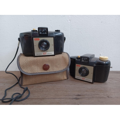 439 - Four vintage Kodak cameras, one Art Deco Six-20 folding, one Art Deco Six-20 II folding and two 'Bro... 