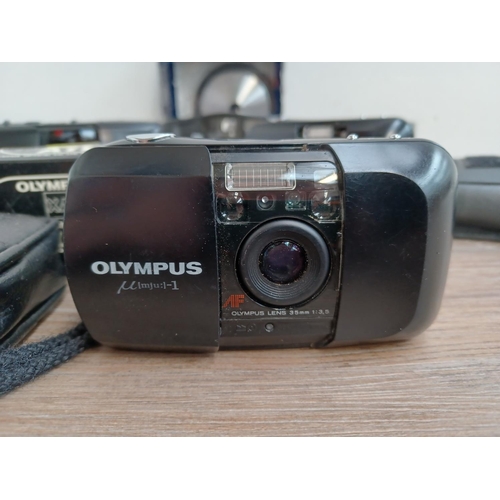 440 - Eight Olympus items to include cased µ[mju:]-1 35mm compact camera, cased µ[mju:] Zoom 35mm compact ... 