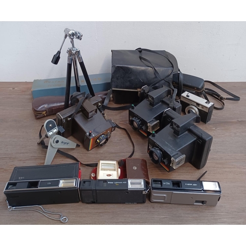 442 - A collection of vintage cameras and accessories to include boxed and cased Rexina De Luxe tripod, ca... 