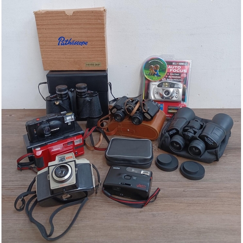 445 - A collection cameras and binoculars to include cased Olympus XA2 35mm compact camera fitted with D.Z... 