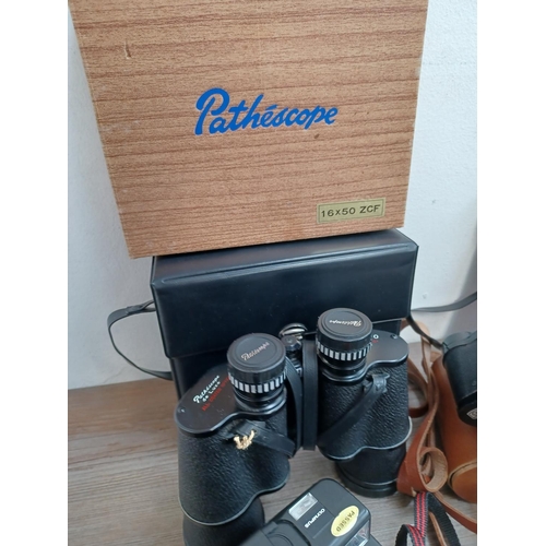 445 - A collection cameras and binoculars to include cased Olympus XA2 35mm compact camera fitted with D.Z... 