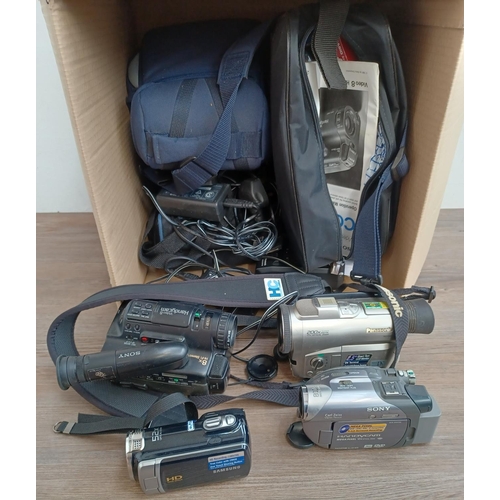 447 - A box containing camcorders to include Samsung, Sony, Panasonic etc.