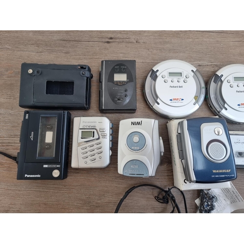 458 - A collection of personal CD players and cassette players to include Panasonic, Sony etc.