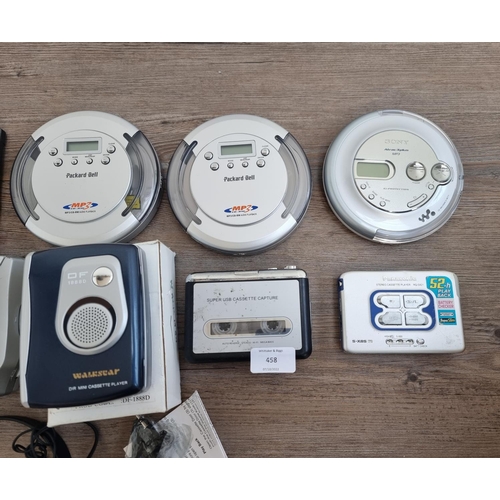 458 - A collection of personal CD players and cassette players to include Panasonic, Sony etc.