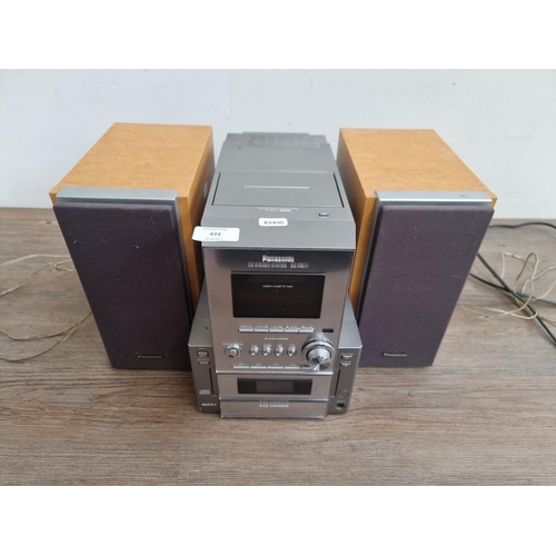 472 - A Panasonic SA-PM17 micro stereo system comprising five CD changer, radio, cassette player and a pai... 