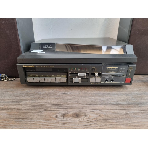 476 - A Panasonic SG-X10 stereo music system comprising two speed turntable, cassette player, two band rad... 