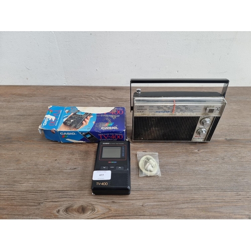 477 - Two items, one boxed Casio TV-400 pocket LCD colour TV and one Bush Sandpiper three band portable ra... 