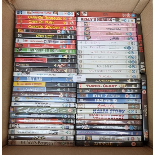 509 - A box containing a collection of sealed DVDs - see images for titles