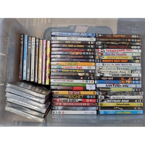 513 - A box containing a collection of sealed DVDs - see images for titles