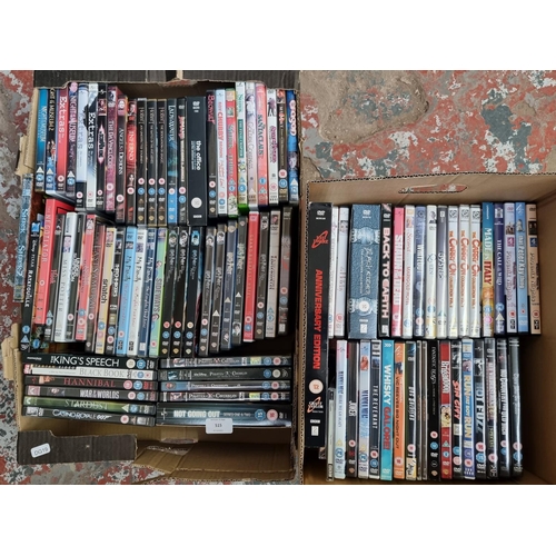 515 - Two boxes containing a collection of DVDs - see images for titles